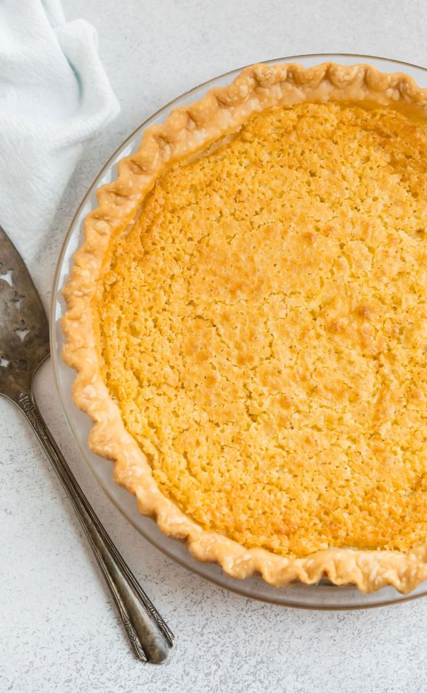 Buttermilk pie is a classic southern custard pie made with basic pantry ingredients. Creamy and rich, it tastes like creme brulee. Easy and DELICIOUS!