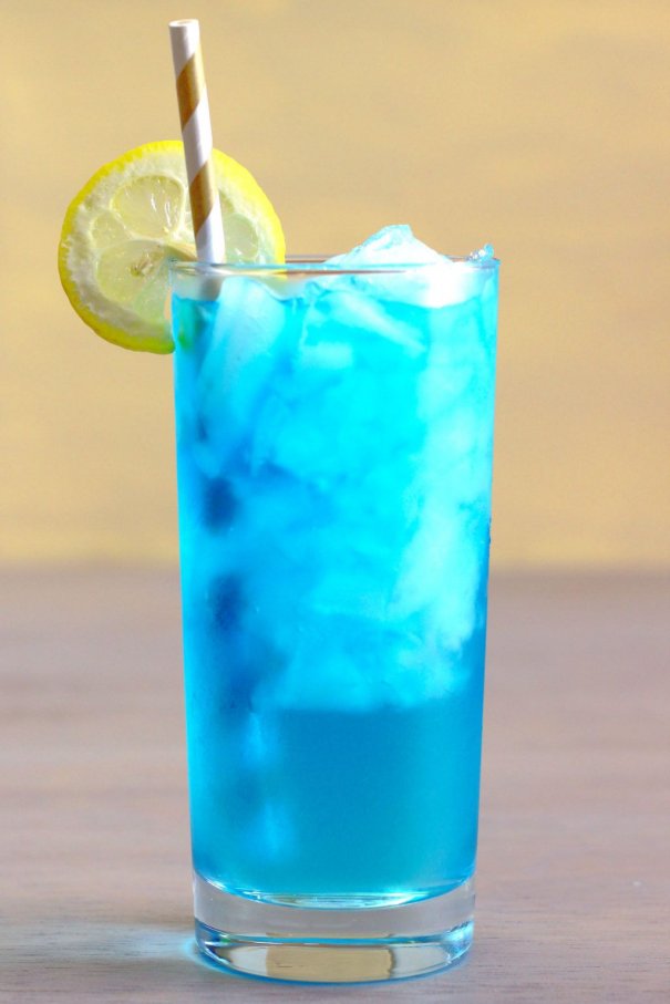 The Sex in the Driveway drink is a variation on the Sex on the Beach drink recipe. The main difference is the stunning bright blue color and the fact that it doesn’t have any cranberry juice.