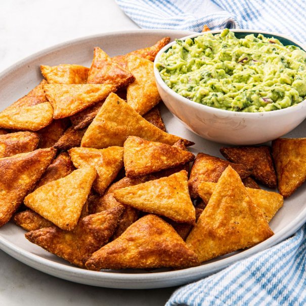 With only two main ingredients these Keto friendly chips are so easy to make! Crispy and salty it's just what we crave. We seasoned ours with chili and garlic powder but you can keep them plain with just salt and pepper or use any of your favorite seasonings.