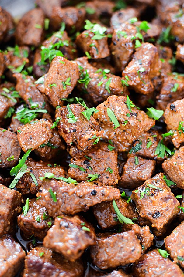 Juicy Garlic Butter Steak Bites are just as incredibly delicious as they sound! Juicy sirloin bites that just melt in your mouth, covered in a sensational butter garlic marinade!