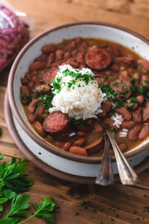 Red Beans and Rice is the epitome of comfort food. Our version of this classic New Orleans recipe uses spicy andouille sausage, and onion, green bell pepper, and celery is used as the base. This dish tastes even better the next day when it's extra thick, creamy and flavorful.