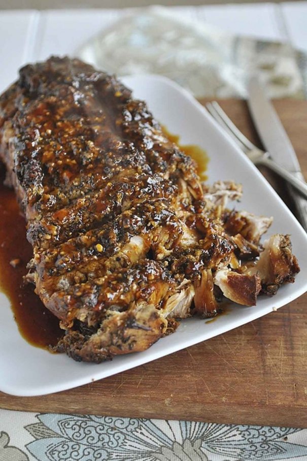 Cover this tender boneless pork loin roast with a mixture of mouthwatering flavors and ingredients like honey, soy sauce, oregano, garlic, and more.