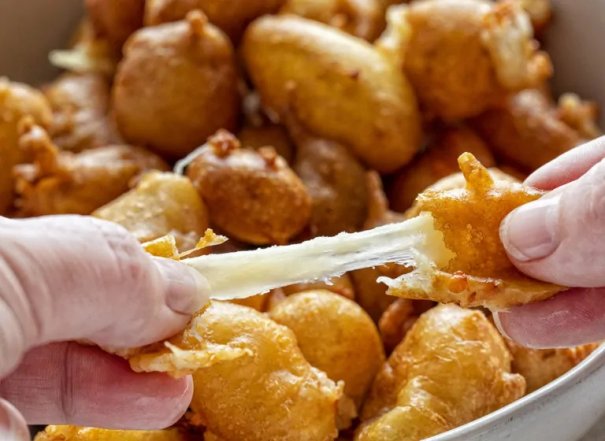 Cheese Curds...the BEST thing to ever happen to cheese.  These ooey-gooey bite-sized appetizers will literally fly out of the bowl. 