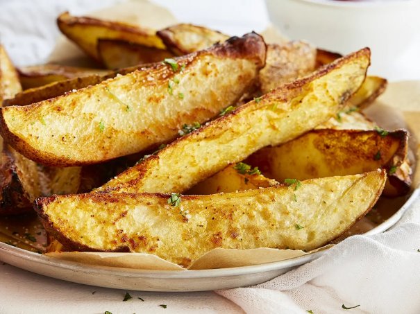Roasted Potato Wedges are the perfect side dish to accompany any meal! These potatoes are perfectly seasoned and the process of oven-roasting brings out their amazing natural flavor!