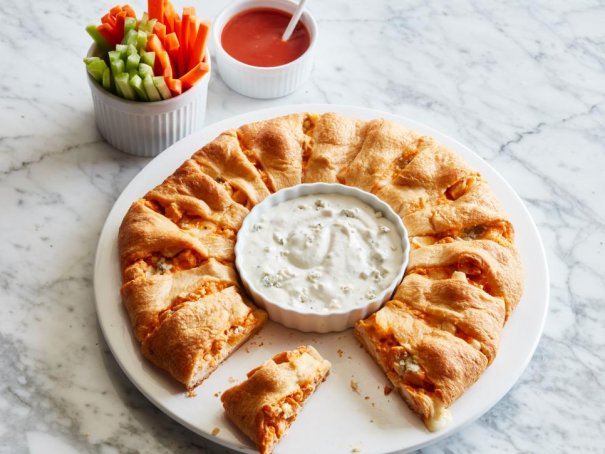 Move over pigs-in-a-blanket: buffalo chicken dip finds a cozy home in crescent dough, too. This shareable ring is perfect for a big crowd -- be sure to serve with extra blue cheese dressing on the side