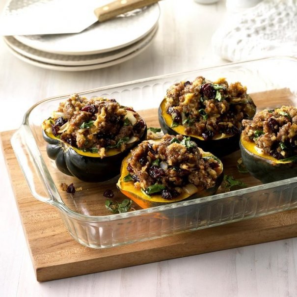 Acorn squash gets a sweet and savory treatment when stuffed with sausage, onion, spinach and cranberries to make this pretty autumn entree. Cooking the squash in the microwave makes this quick enough for a busy weeknight.