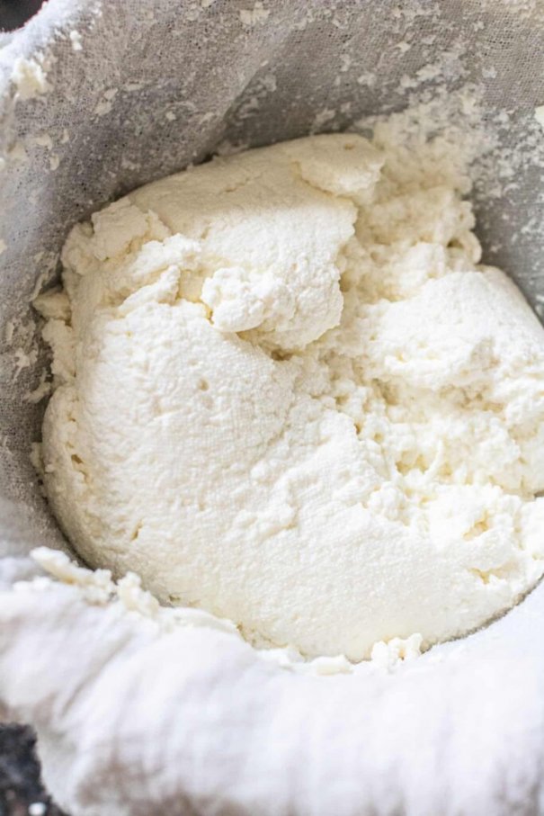 Are you interested in making your own cheese? Homemade Ricotta Cheese is one of the easiest cheeses to make at home and so much better than store bought!