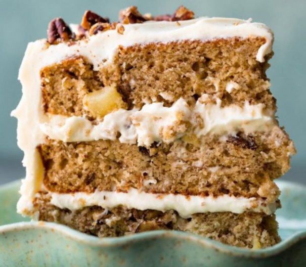 Homemade hummingbird cake is exceptionally moist and flavorful with 3 delicious layers and silky cream cheese frosting!