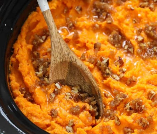Sweet and savory, creamy and crunchy (with pecans!). This Crockpot Sweet Potato Casserole is everything it sounds like!