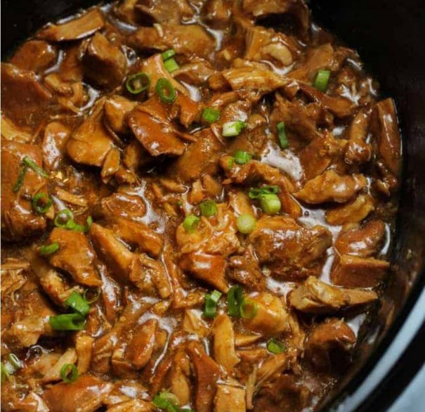 Crock Pot Bourbon Chicken is easy and delicious! Tender juicy chicken is cooked in a rich bourbon ginger sauce for a delicious meal. We love this Crock Pot meal served over rice with a side of steamed broccoli.