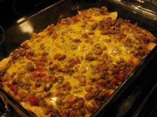 This is a very easy and delicious dish. I often substitute ground turkey and low-fat dairy and it's still delicious! Served with chips, sauce and green salad.